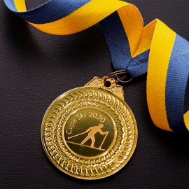 Medalie aurie gravata in cutie de plastic